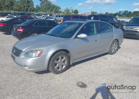 2003 Nissan Altima 2.5 Sl z USA, uszkodzony, nr VIN 1N4AL11E23C351965